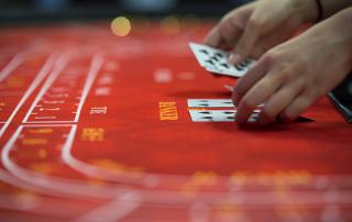 Macau tells casinos cut on-duty staff by 90pct: reports