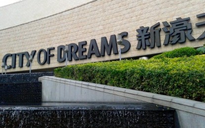 Melco Crown special dividend, amends quarterly policy