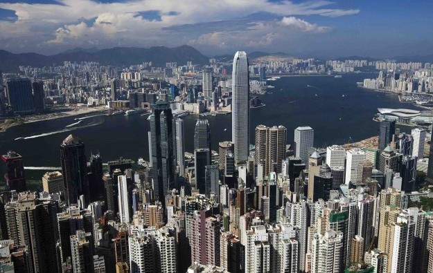 HK inches to travel norms, no-quarantine arriving via Macau
