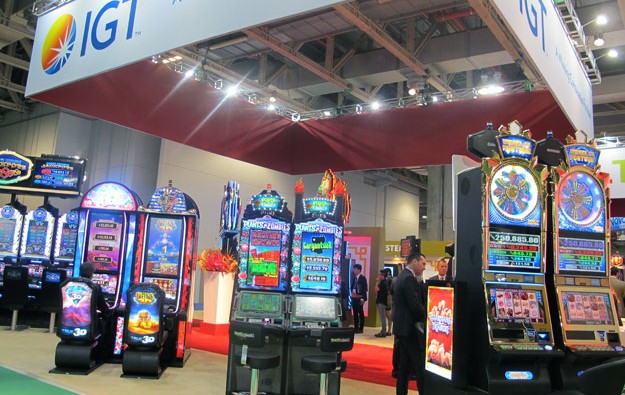 IGT 2Q revenue up, but earnings hit by debt costs