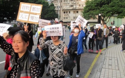 Hundreds of Macau casino workers rally for pay hike