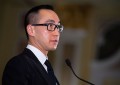 Lawrence Ho pledges annual base pay to Melco share plan